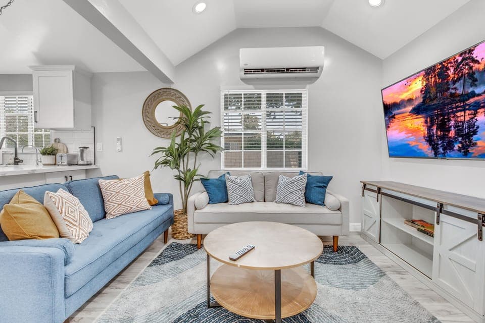 Relax in this cozy living room featuring comfortable seating