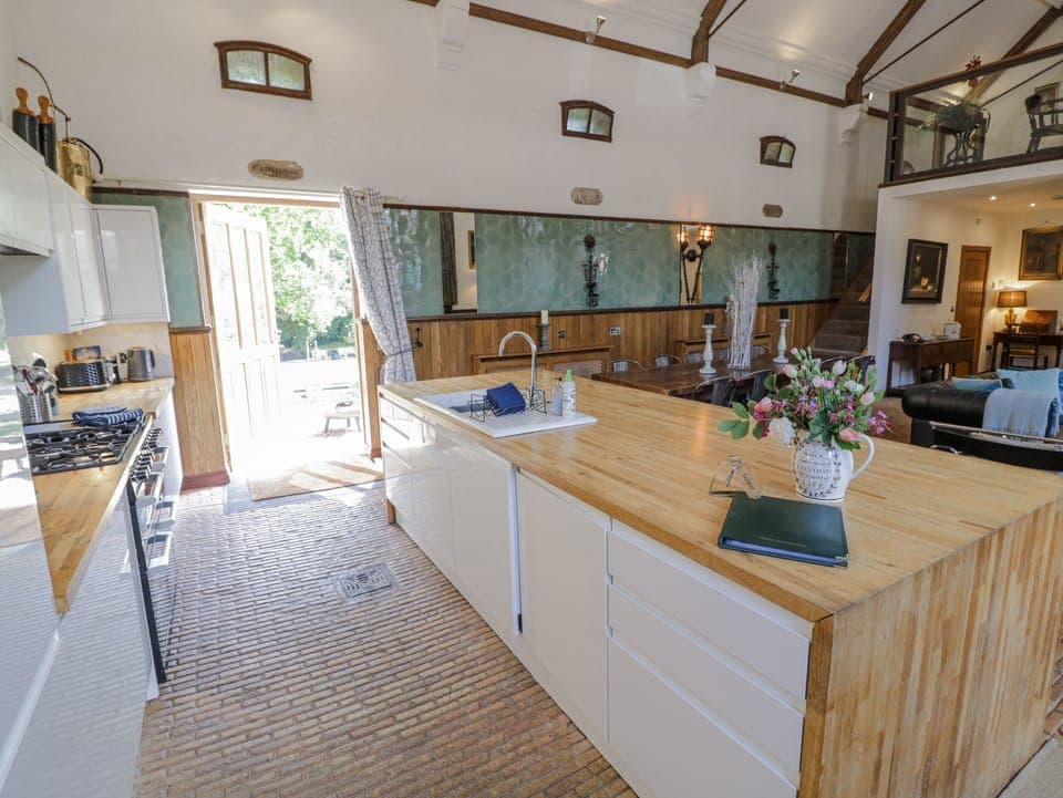 Fridge, electric kettle, toaster, cookware/dishes/utensils