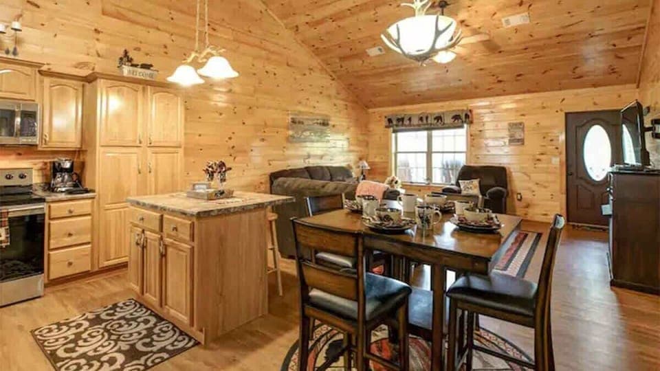 Kitchen & Dining Area: Delight in this charming space with rustic wooden accents and inviting decor!