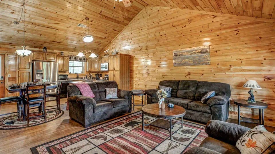 Living Room: Rustic charm meets modern comfort—perfect for game nights and family gatherings!