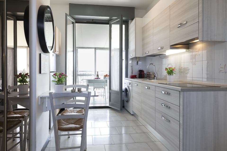 Panoramic Apartment | Private kitchen | Full-size fridge, microwave, stovetop, dishwasher