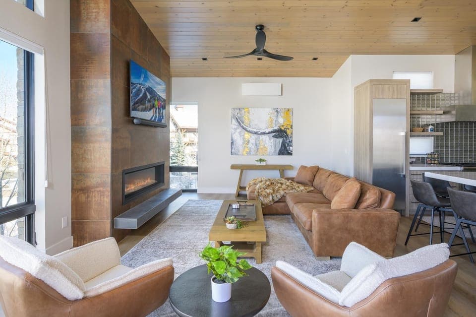 Plush living room with modern leather furniture