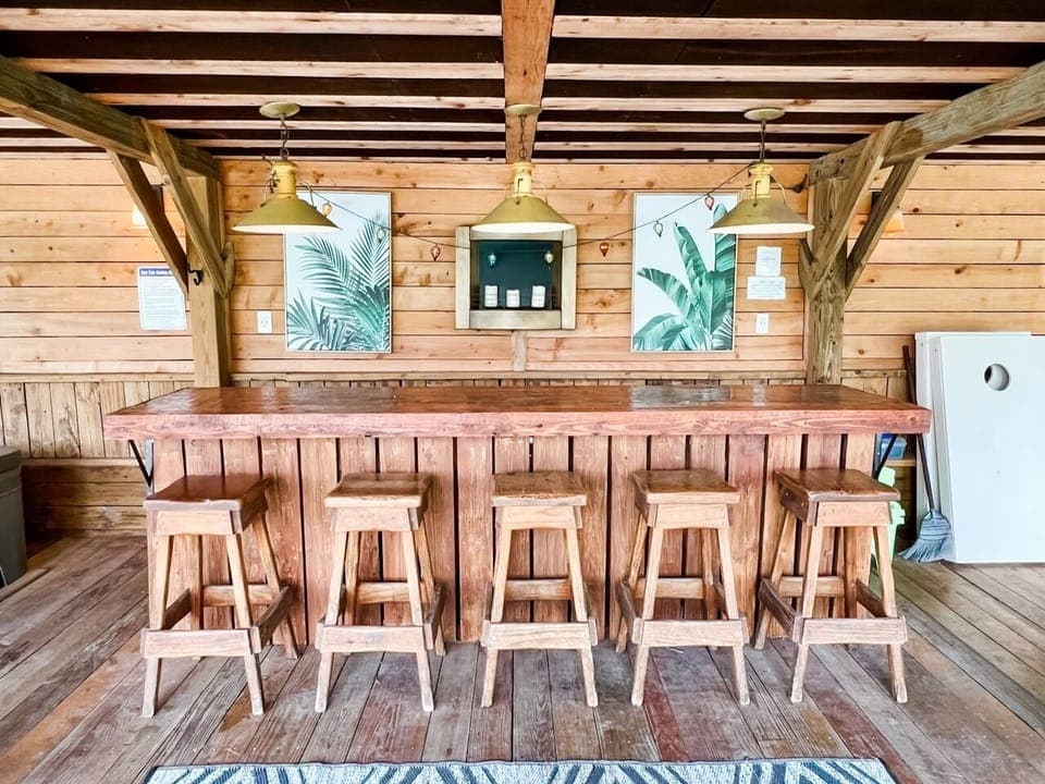 Outdoor patio offers a nice bar to hang day or  night