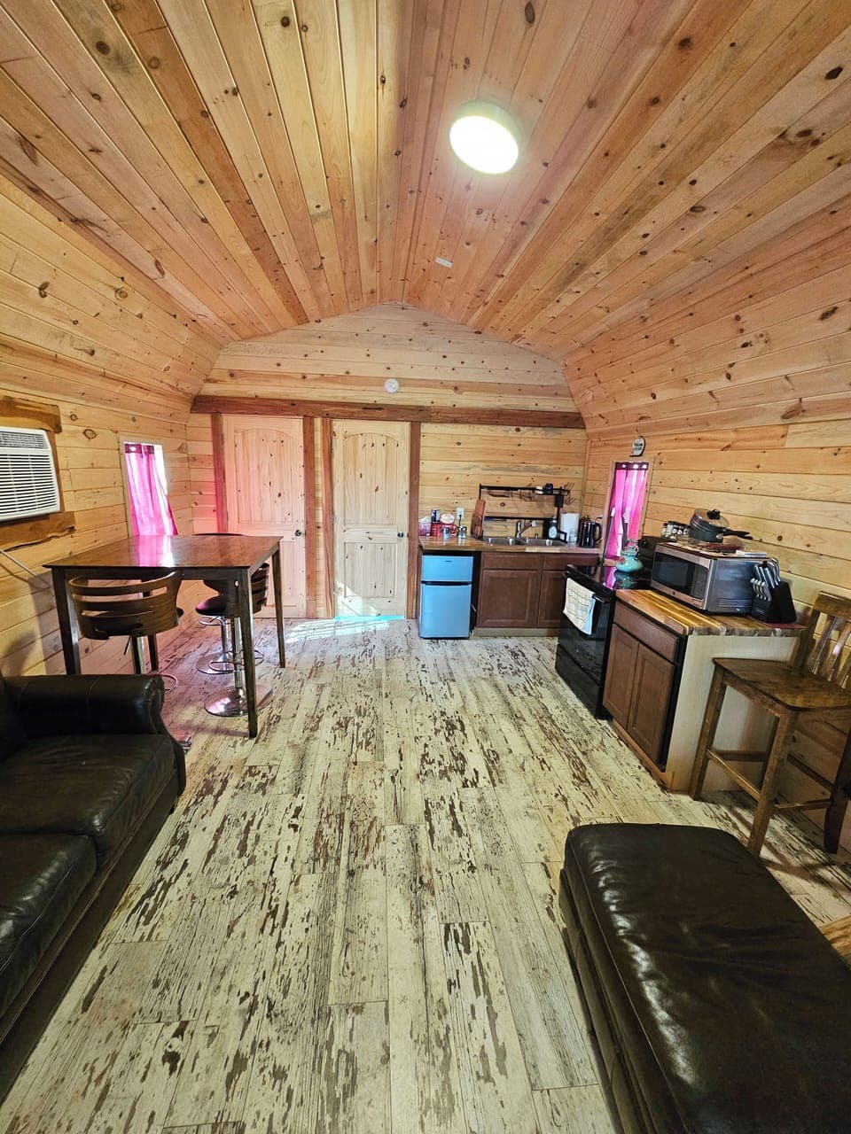 Living room, kitchen, and dining area