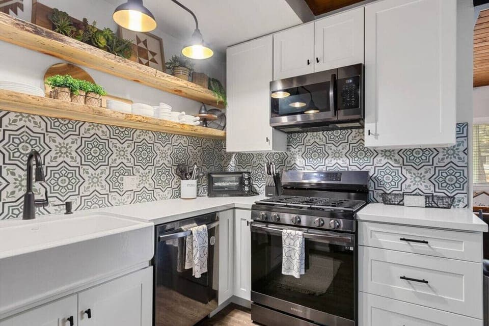 Chic remodeled kitchen with new appliances.