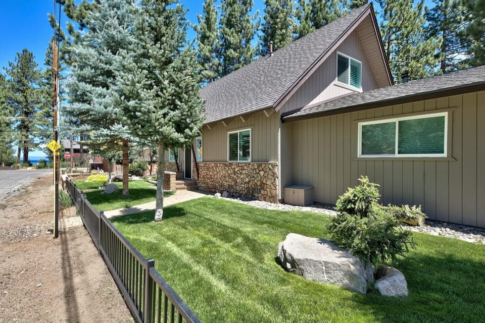 Front of home with lake just beyond