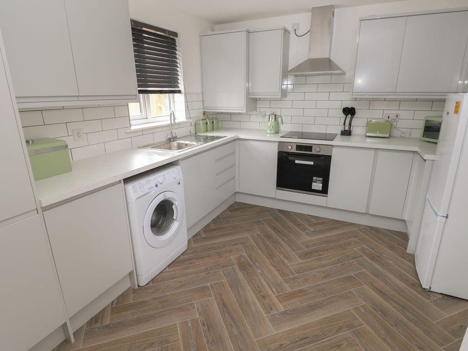 Fridge, electric kettle, toaster, cookware/dishes/utensils