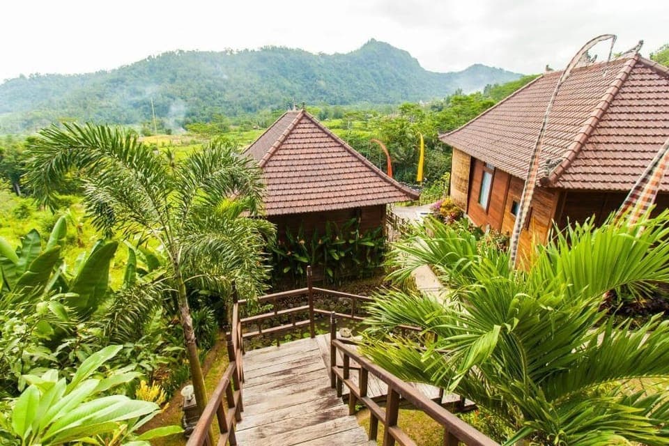 Deluxe Double Room, 1 Bedroom, Balcony, Mountain View | Living area | 15-inch flat-screen TV with digital channels