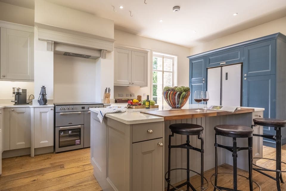Well-equipped kitchen with electric range oven