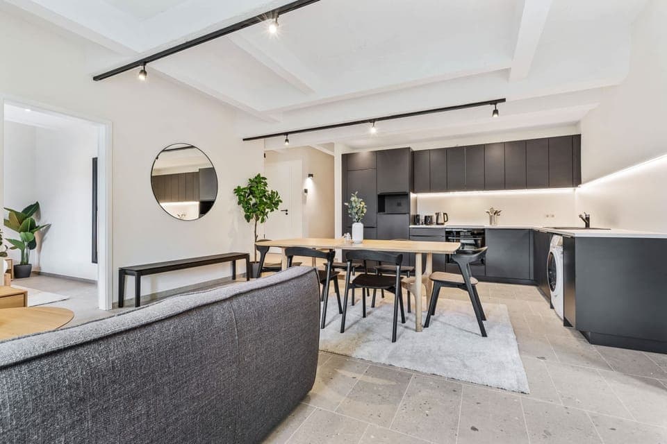 Our open-plan space combines the living area, dining, and kitchen, perfect for social evenings.