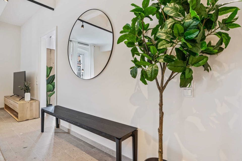 Step inside our welcoming entryway, where modern design meets homely warmth.