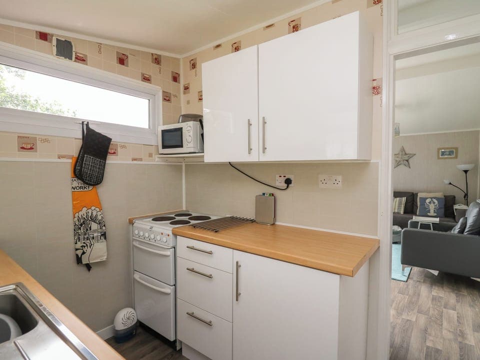 Fridge, electric kettle, toaster, cookware/dishes/utensils