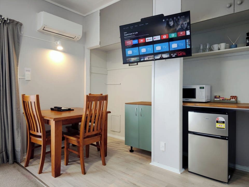 Classic Suite | Living area | 43-inch Smart TV with cable channels