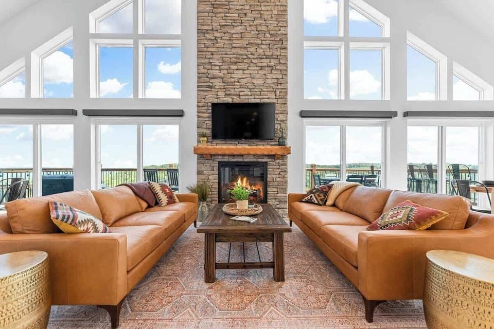 Large Family Room with floor to ceiling windows (with a great view), and cozy seating 