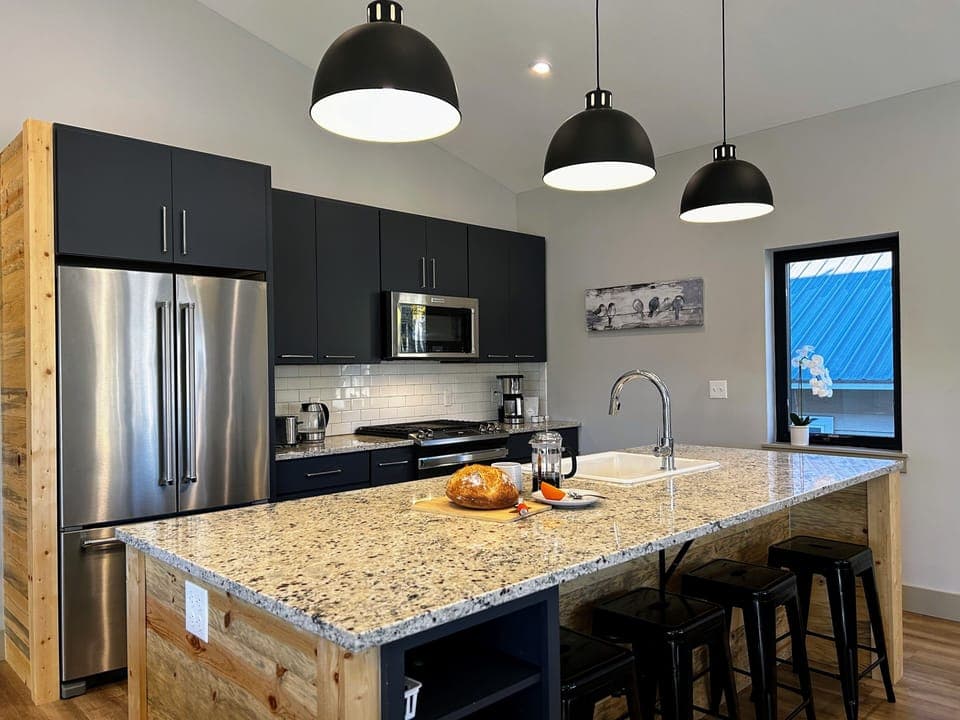 Well Equipped Modern kitchen with Granite and Stainless Appliances