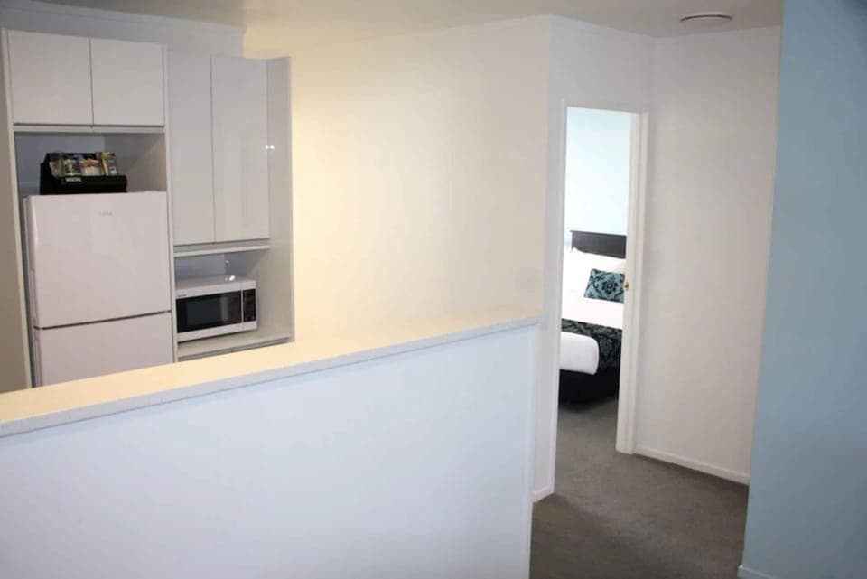 Two Bedroom Apartment  | Private kitchen | Fridge, microwave, cookware/dishes/utensils