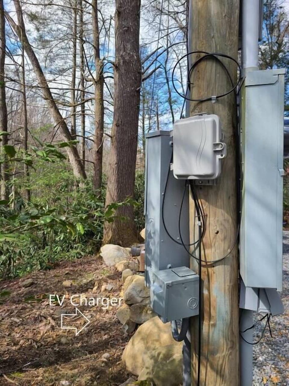 Electric Vehicle charger is small box near bottom