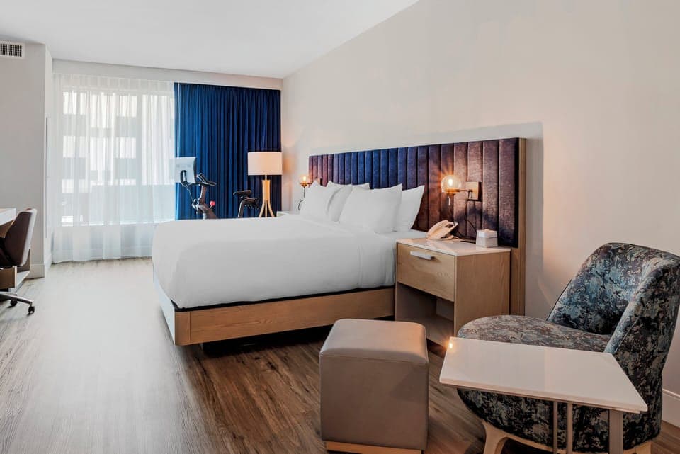 Premium Room, 1 King Bed, Pool View (with Peloton Bike) | 1 bedroom, premium bedding, pillowtop beds, in-room safe