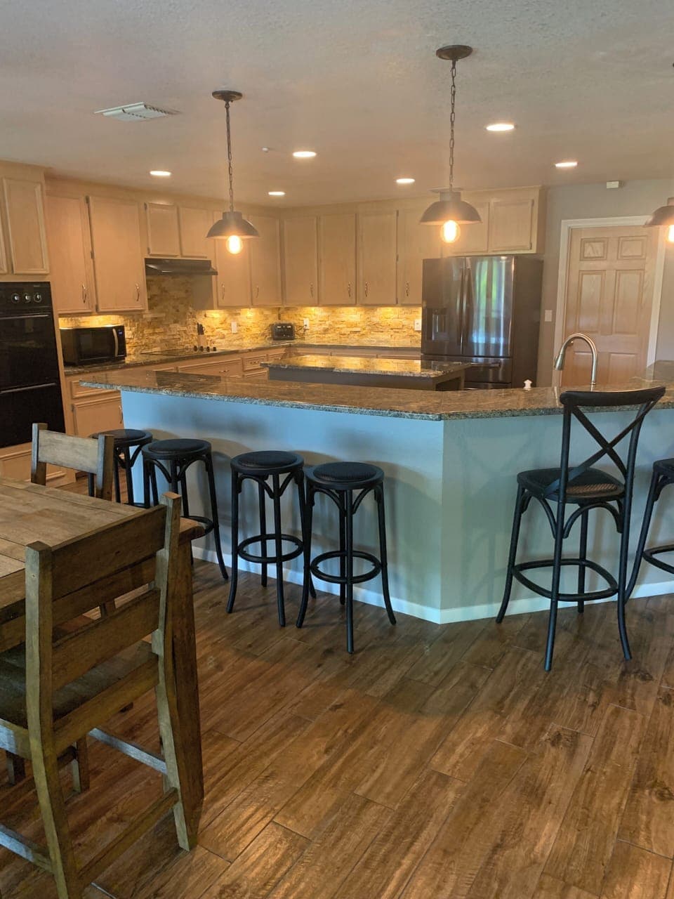 Dining area seats 6 and Breakfast bar seats 6 more