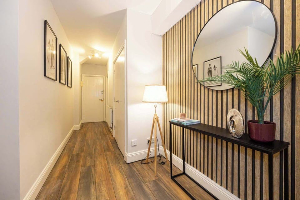 Step into comfort with this inviting hallway that leads to your perfect getaway.