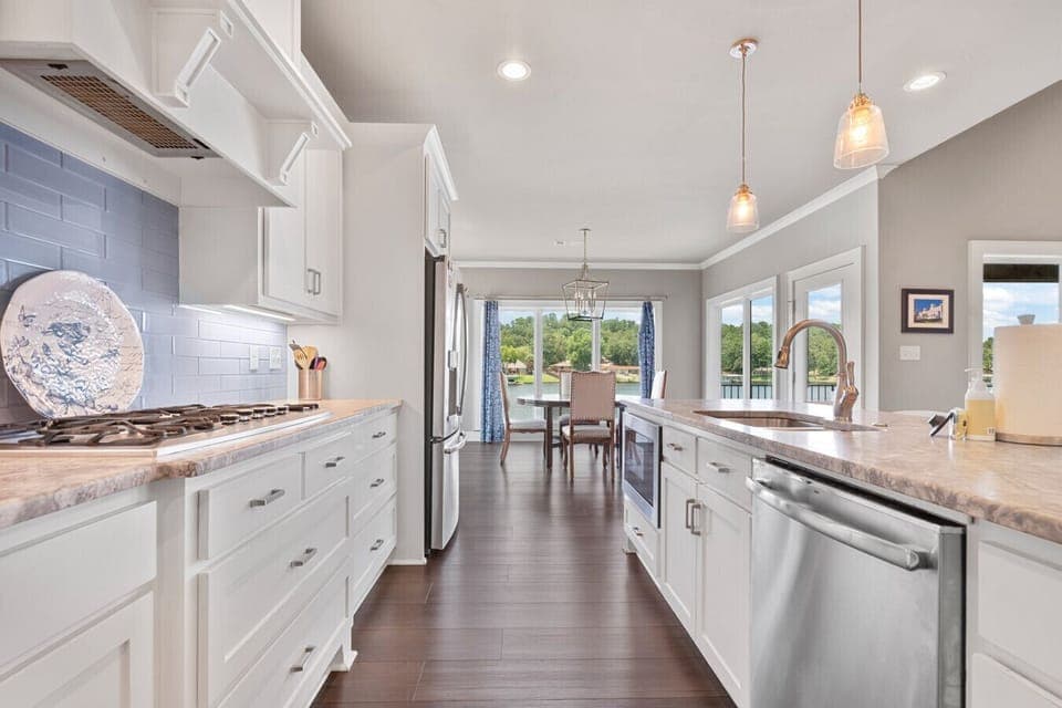 Bright, open kitchen with a large island and modern design.