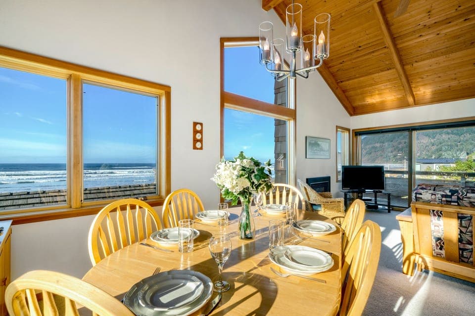 Dining room with seating for 6, ocean views and mountain views.