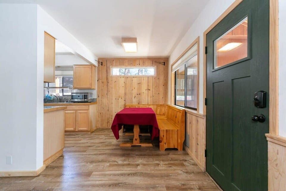 The view into the dining area and kitchen from the front door.