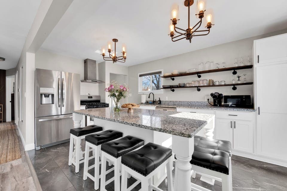 Open Concept Kitchen with All Amenities and Stainless Steel Appliances
