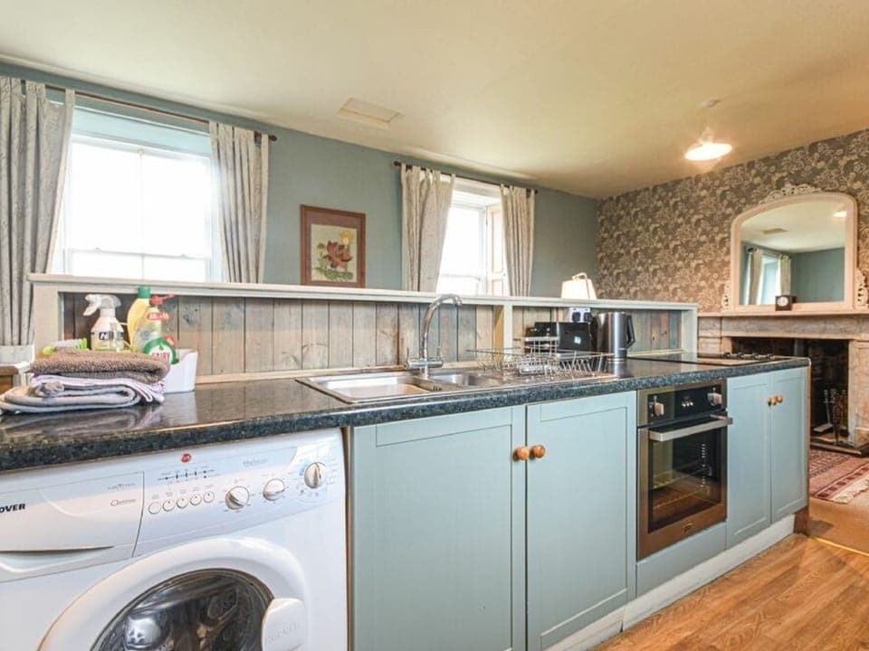 Fridge, electric kettle, cookware/dishes/utensils