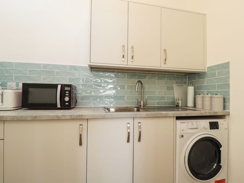 Fridge, electric kettle, toaster, cookware/dishes/utensils