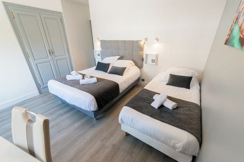 Classic Triple Room | Premium bedding, Select Comfort beds, desk, laptop workspace