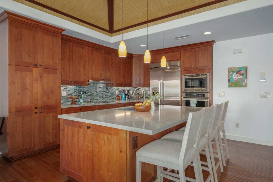 Quartz counter tops, real wood cabinets and stainless steel appliances.