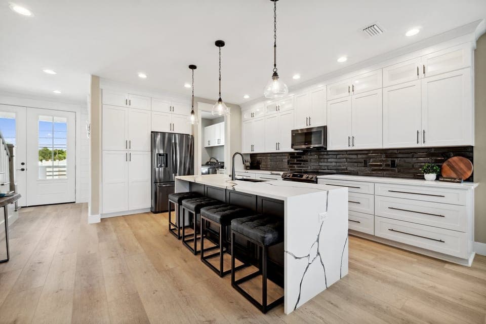 Fully equipped kitchen with stainless appliances and ample prep space on the 2nd floor