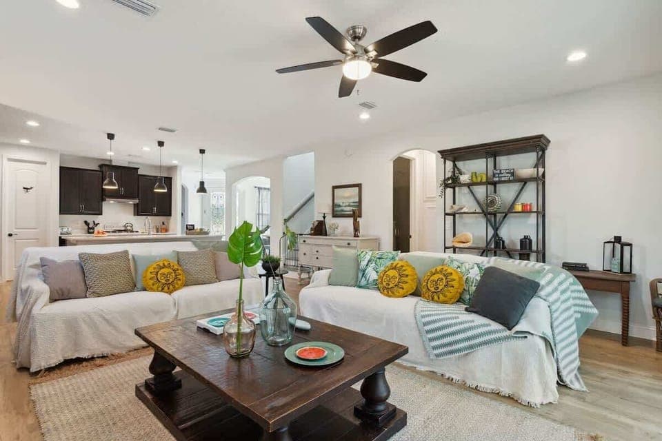 Spacious main living room with 75in TV and seating for 8 people. Enjoy a movie to relax after a day filled with fun with family and friends!