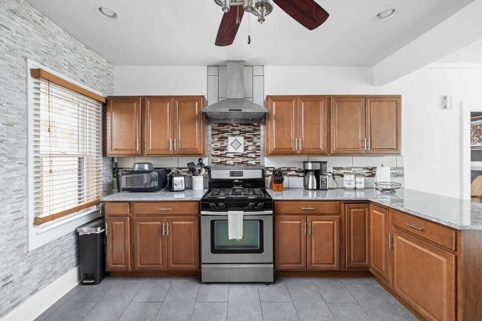 Our strikingly elegant kitchen, fully equipped with all the essential tools and appliances