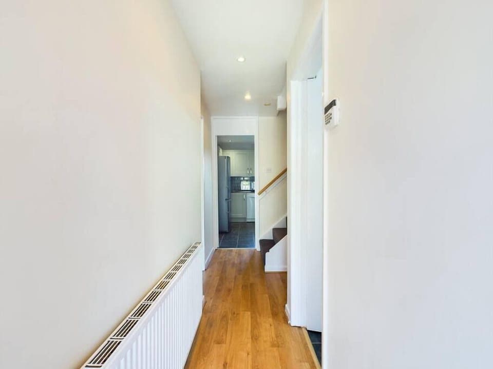 Corridoor- leading to living room and kitchen .