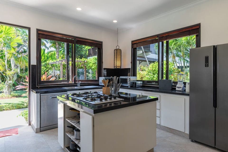 Electric kettle, highchair, cleaning supplies, paper towels