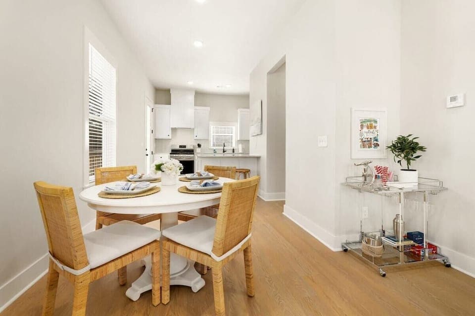 This space features plush seating, a large Smart TV, operable gas fireplace, dining table for 4, and a bar cart to whip up your favorite vacation drink.