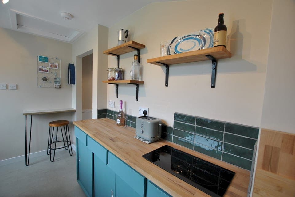 The original, bespoke kitchen was hand-built by the owners’ grandfather