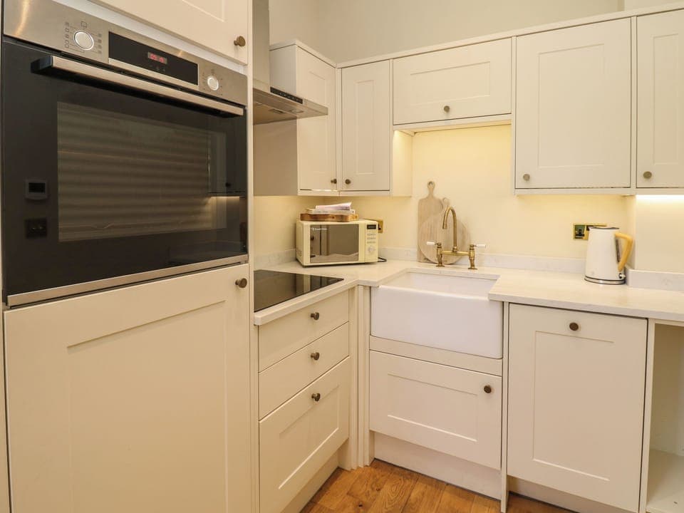 Fridge, dishwasher, electric kettle, cookware/dishes/utensils