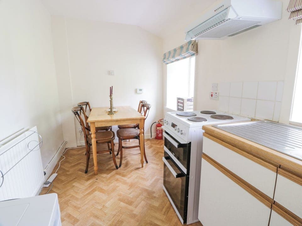 Fridge, electric kettle, toaster, cookware/dishes/utensils