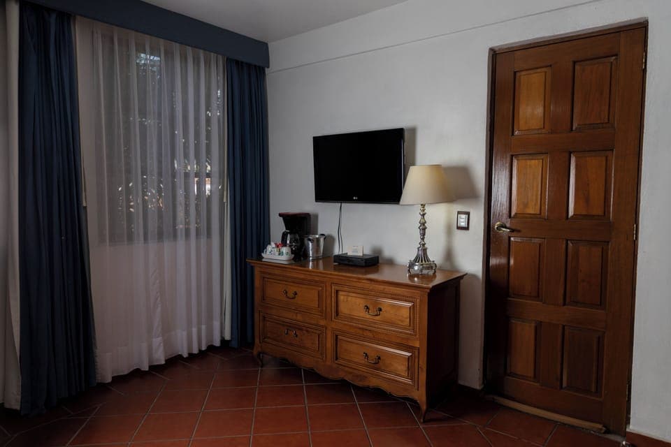 Suite, 1 King Bed | Television