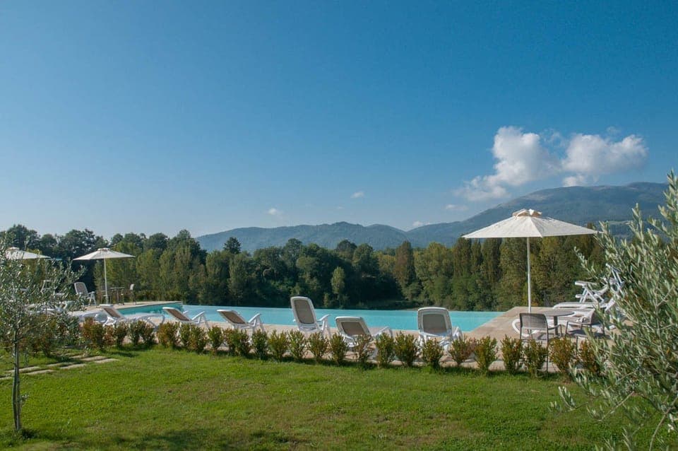 Seasonal outdoor pool, pool umbrellas, sun loungers