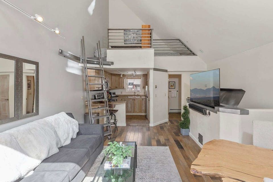 Internal view of living area and upstairs loft.