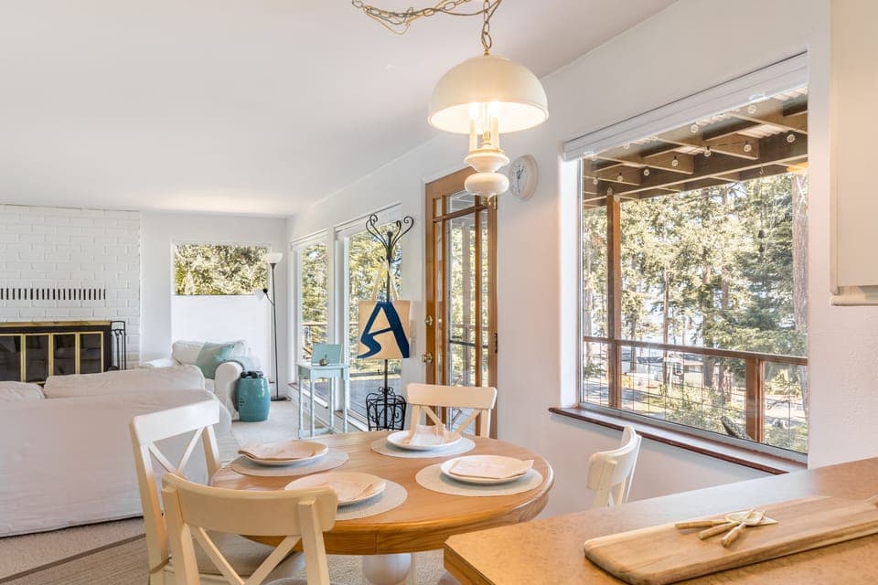 Sunlit dining area adjoining the living space.