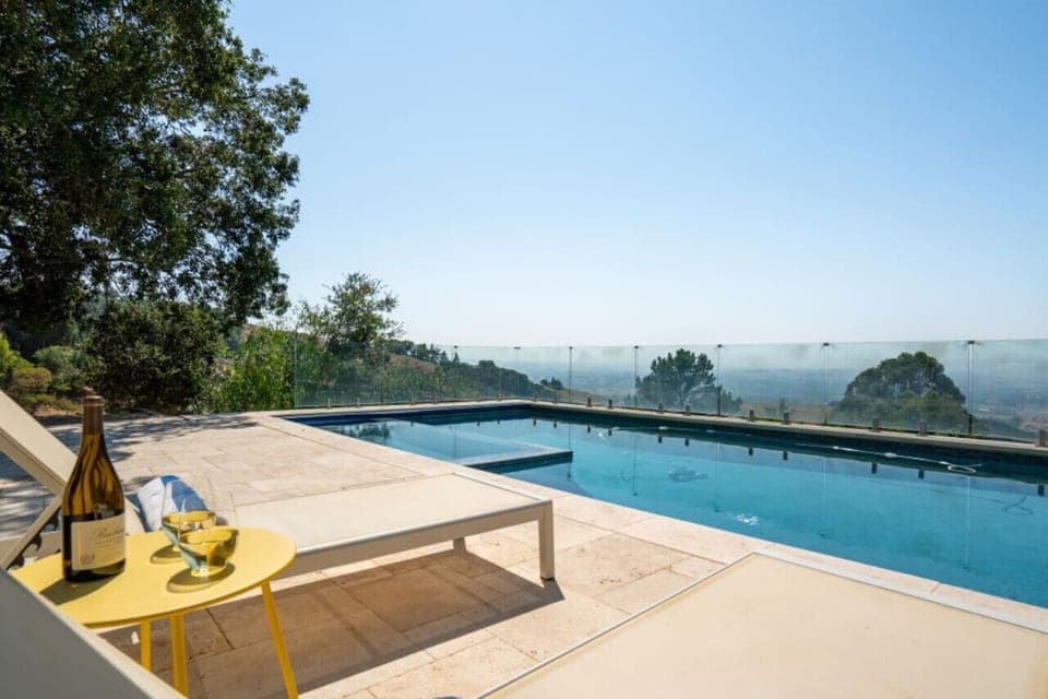 Enjoy local wine by the pool!