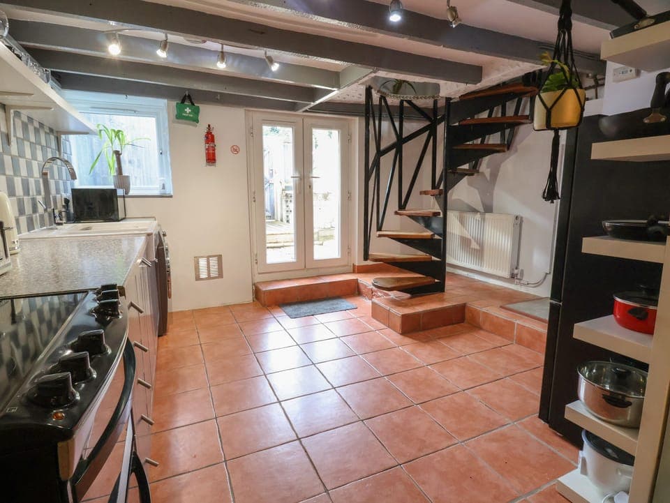 Fridge, electric kettle, toaster, cookware/dishes/utensils