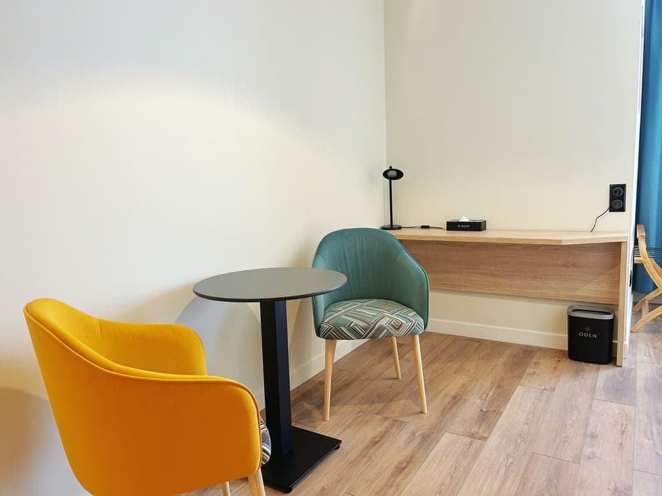 Deluxe Room, 1 Queen Bed, City View | In-room safe, desk, laptop workspace, blackout drapes