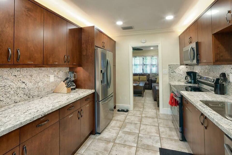 Kitchen is easy access to the front Living Room. 