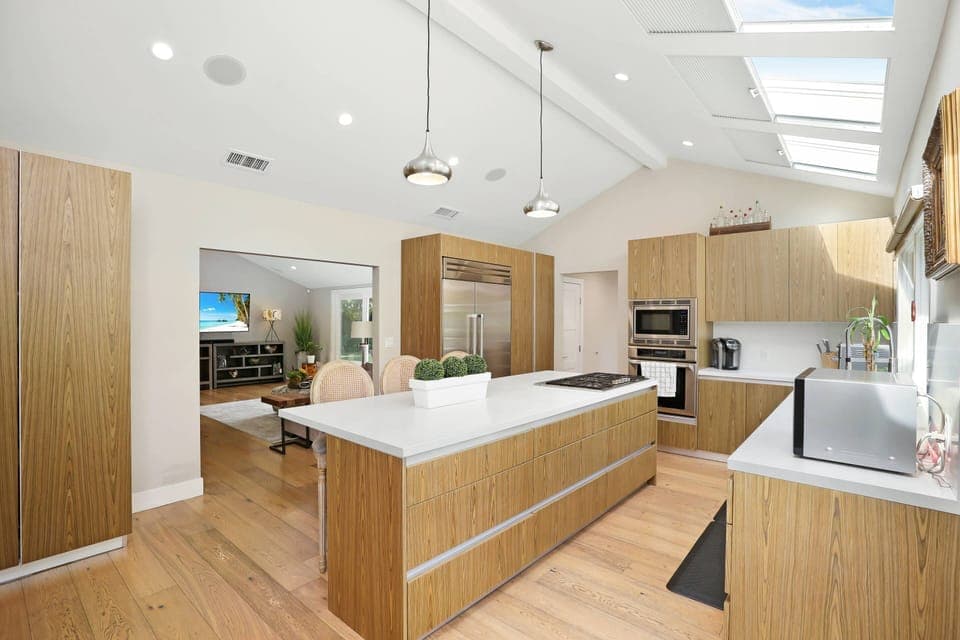 The kitchen is very bright and open....cooking here is a social event!